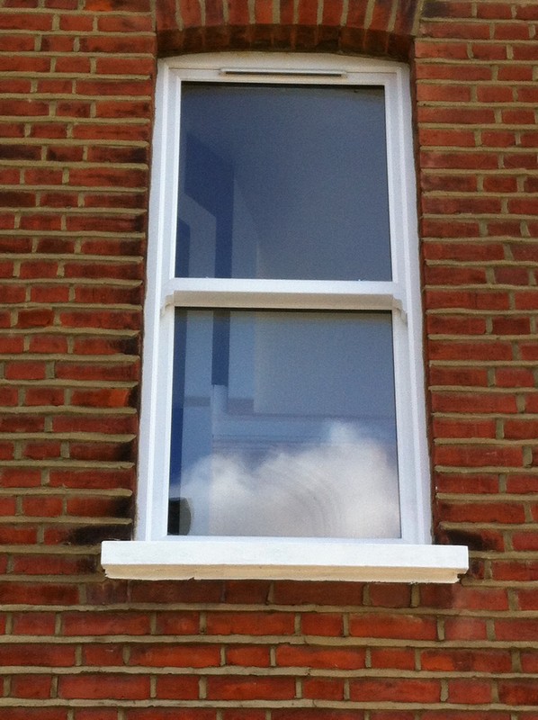 uPVC sash window on Victorian red brick house in Banbury